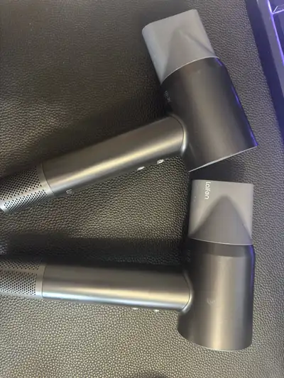 Selling two Laifen Swift Hairdryers together. -One works, but the internal wire lights up a little -...