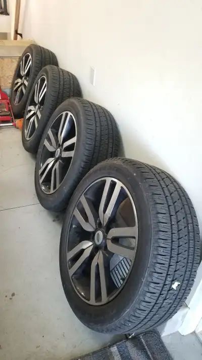 Set of four (4 each) Bridgestone Dueler H/L Alenza Plus all-season tires with Land Rover 20" rims. S...