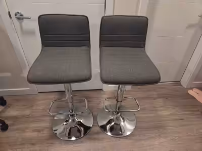 2 height adjustable bar stools. Works for most kitchen islands.