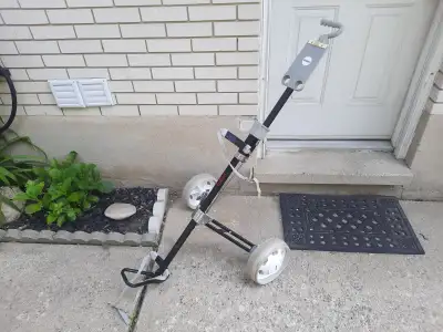 A nice collapsible golf bag cart..$15