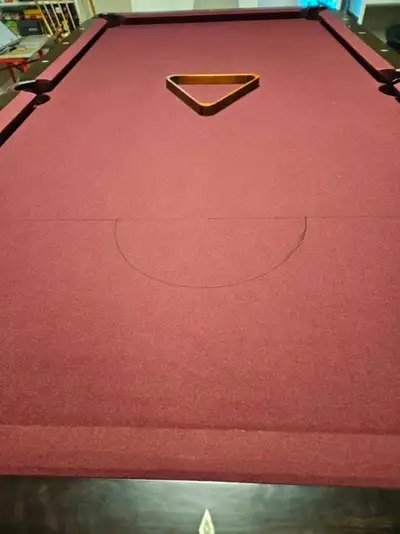 Dufferin slate pool table for sale. Includes snooker balls, regular pool balls, 4 pool cues and othe...