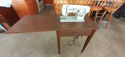If ad is up, item is available. Vintage Viking Sewing Machine in Cabinet. Model 364R. Has foot pedal...
