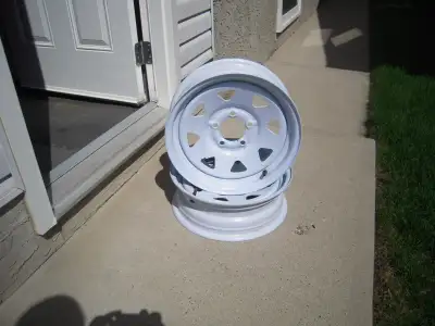 This listing is for two white utility trailer rims (a set). NOTE: I am selling these for a family me...
