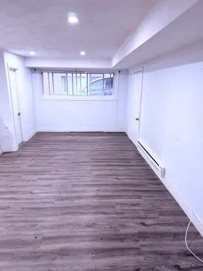 Spacious 3 ½ Basement Apartment