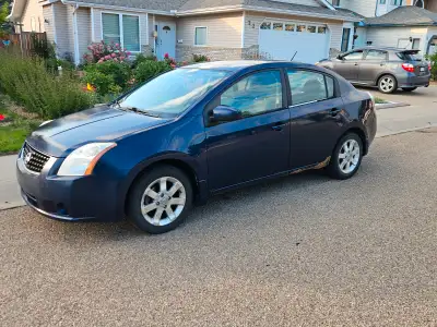 2008 Nissan Sentra, with low KMs (currently 167,036), has been used a daily driver, we have owned it...
