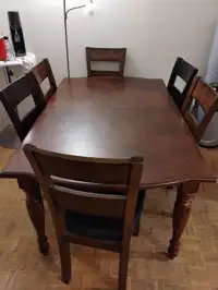 Solid wood dining table and 6 chairs