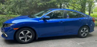 Pristine 2019 Aegean Blue Honda Civic LX, low kms.