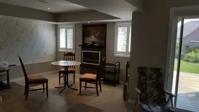 One private room with two windows in walkout basement with seperate entrance from outside house. sha...