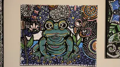 Add a unique touch to your space with this original painting, a vibrant depiction of a frog surround...