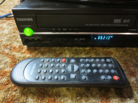 Toshiba SD-V398 DVD/ VHS player recorder combo.