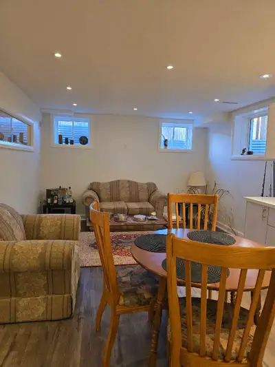 Furnished two-bedroom basement apartment with a separate entrance, all amenities, including a separa...