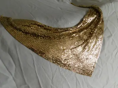 Matching clutch purse, necklace, and earrings, View more