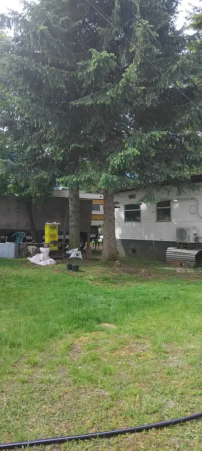 Corner lot with two mobiles willing to trade for a 2005 and newer quad cab 4x4,long ,box, 3500 dodge...