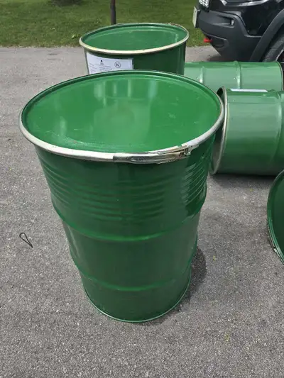 I'm selling green 55-gallon steel drums, perfect for various storage and industrial needs. These dru...