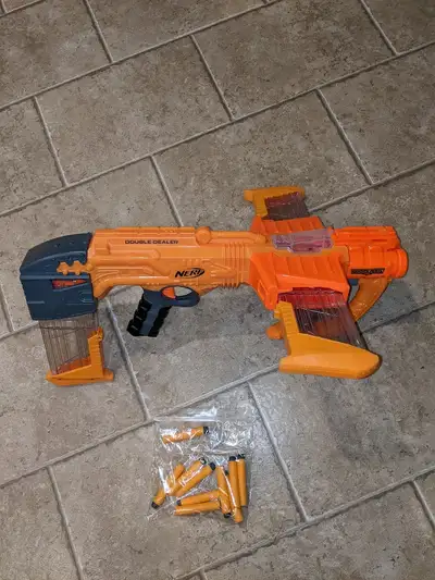Selling for my grandson! Here is the NERF Doomlands Double Dealer Blaster It fires two darts at once...