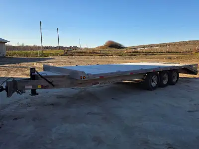 2023 tri axle galvanized trailer built by Trailerworld Industries Inc. 20 ft flat deck on top with 5...