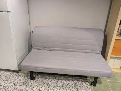 Turns easily into double bed. Comes with a cover that was a bit damaged in the washer, but is possib...