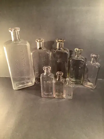 For sale are 8 T. Eaton Drug Co. Limited Toronto pharmacy medicine bottles from the 1930’s. They var...
