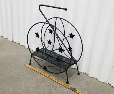 Magazine rack steel mcm black circular Cdn maple leafs c1950s, View more