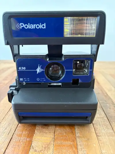 Vintage Polaroid camera 600 series, View more