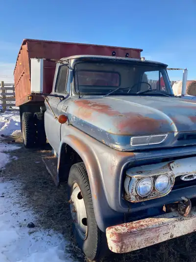1966 GMC Grain truck with hoist that still works. Starts and runs. Would be a good project truck or...