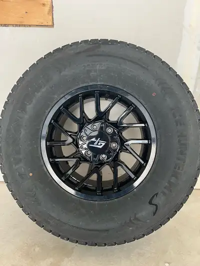 Barely used STUDDED winter tires and wheels for sale. Purchased at Grizzly trucks last winter and on...