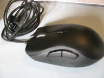 Razer Naga Trinity Model RZ01-0241 Gaming Mouse. In like new working condition. Only the one side pl...
