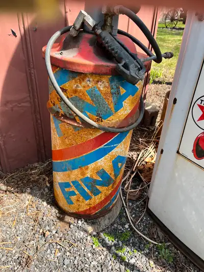 Fina Gas Station Vintage grease can (about 20 gallon). With grease. Air feed/pump attached. $100