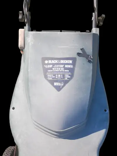 Black& Decker lawnmower. I have MANY old mowers, View more