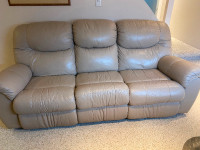 Leather reclining sofa and loveseat