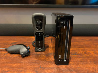 Nintendo Wii RVL-101 avec 1 Manette et 3 Jeux