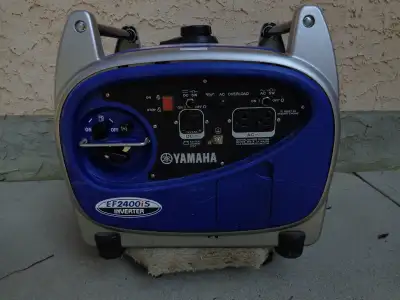 EF2400iS WITH OWNERS MANUAL AND FACTORY ACCESSORIES POWER FOR A/C IN RV , BOUGHT NEW FROM WOODYS RV...