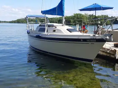 1984 O'Day 26 sailboat with road trailer and Honda 9.9 extra long shaft electric start outboard. Sha...