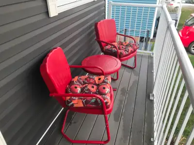 Red metal patio chairs/ table and cushions $200