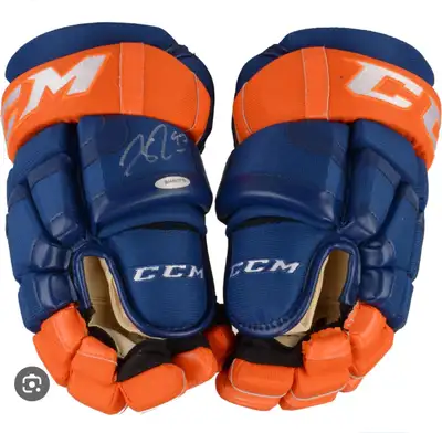 Connor Mcdavid Signed Gloves by UPPER DECK, View more