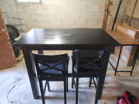 High table with 3 bar chairs. 
