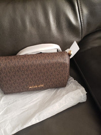 Brand new brown Authentic michael crossbody purse for sale