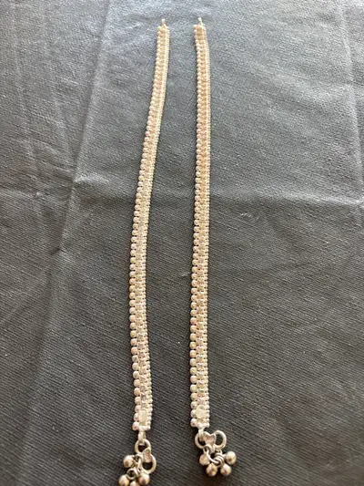 STEALING SILVER ANKLETS $250., View more