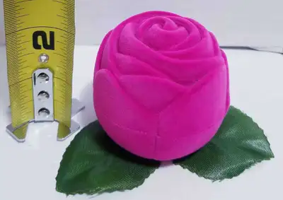 I'm selling a cute, pre-owned Silverworks ring box shaped like a pink rose, perfect for a special oc...