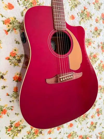 Harkening back to their colorful acoustics of the 1960s, Fender’s Redondo Player acoustic-electric g...