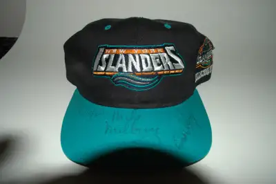 Vintage NY Islanders Fisherman logo hat, made by Starter. The hat features the short lived Fisherman...
