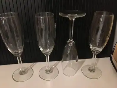 Champagne glasses $15 for 4, 5 oz, 8” tall from stem to top, View more