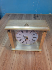 Bulova carriage style clock , like new with RCMP emblem on top. 