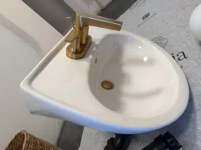 White pedestal sink and Faucet, View more
