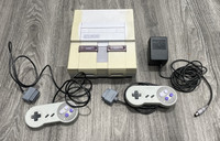 SNES CONSOLE W/ CORDS, &amp; CONTROLLERS