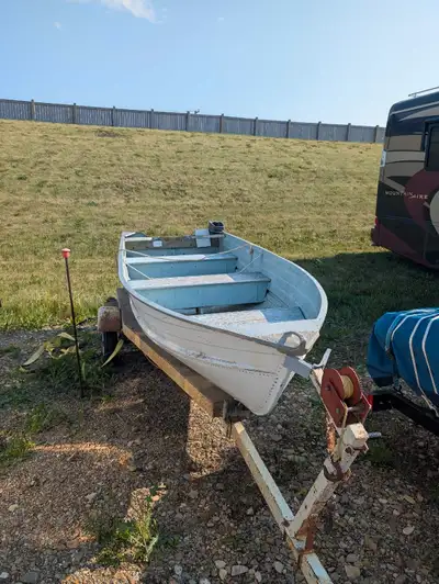 12 foot Simpson Sears riveted aluminum boat with 6HP Johnson Seahorse motor for sale. The boat does...