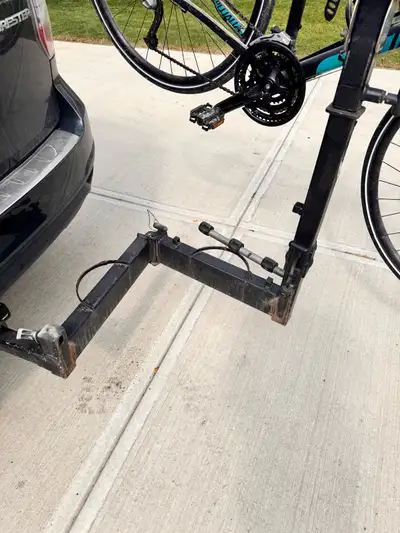 This is a Thule bike rack (older model with swing arm so you can access hatch with bikes on can hold...