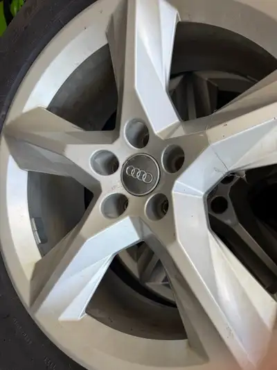 These Michelin 255/55R19 winter tires are mounted on high-quality Audi rims and are in brand new con...