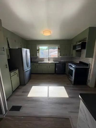 Newly Renovated FURNISHED 3 bedroom main floor apartment in a quiet neighborhood, 3km from Confedera...