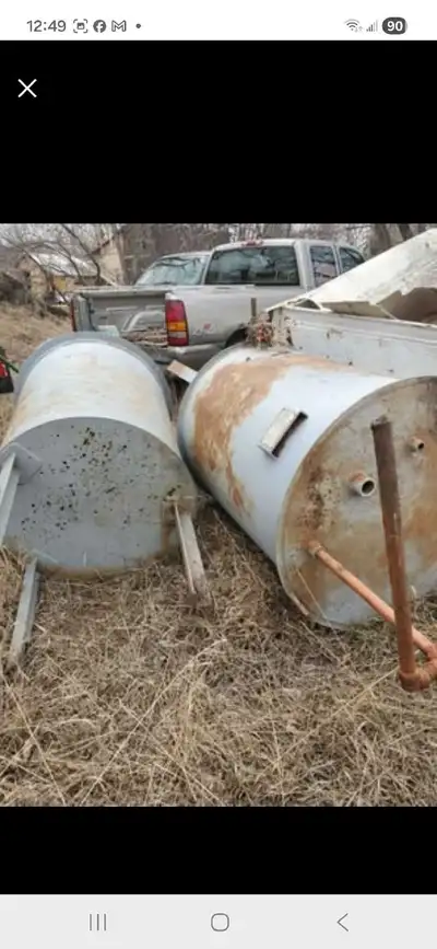 Hi im posting for a friend he has a couple steel barrel tanks with stands . They are 49" L x 31" W f...